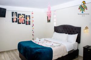Rúm í herbergi á Hotel Valle Andino +37 myndir
