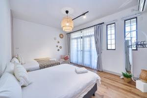 Voodi või voodid majutusasutuse HiHi Skylight toas
