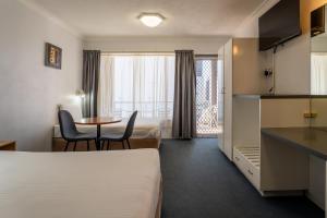 Postel nebo postele na pokoji v ubytování Port Aloha Motel + 37 fotografií