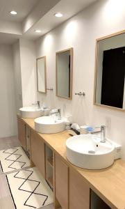 Koupelna v ubytování 難波ゲストハウスjakotelplus 難波店 + 35 fotografií