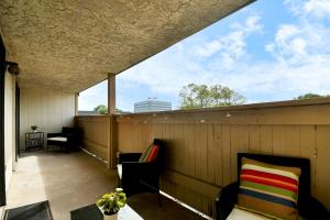 a balcony with a view of the sky at Tranquil 3BR Getaway:Modern in Houston