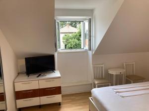 Posteľ alebo postele v izbe v ubytovaní Guest House Libertas