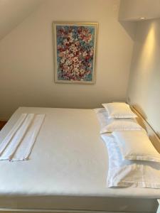Posteľ alebo postele v izbe v ubytovaní Guest House Libertas