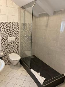 Kúpeľňa v ubytovaní Guest House Libertas