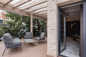 Χώρος καθιστικού στο Egoist Boutique Suites