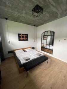Postel nebo postele na pokoji v ubytování Dyke Appartements