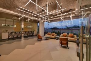 Χώρος καθιστικού στο Click Hotel Pithampur
