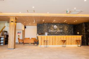 a restaurant with a sign that reads shock lake at Shoji Lake Hotel in Fujikawaguchiko