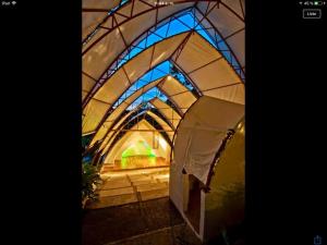 an inside of a dome with a stained glass window at The Cloud Forest Magical Villa in Monteverde Costa Rica