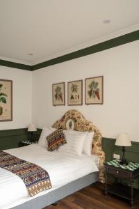 Postel nebo postele na pokoji v ubytování The Gate Boutique Hotel Sapa