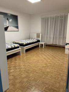 Ein Bett oder Betten in einem Zimmer der Unterkunft CH01 Schönes Apartment nahe Zentrum Basel