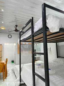Lombokhouse Mandalika客房内的一张或多张床位