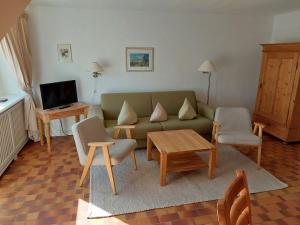 TV a/nebo společenská místnost v ubytování Falkenweg 7