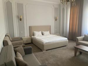 Ліжко або ліжка в номері Dinar