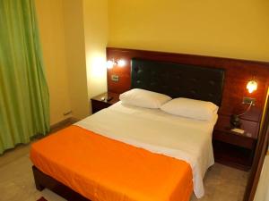Postel nebo postele na pokoji v ubytování Hotel Filoxenia