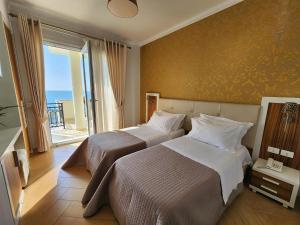 Postel nebo postele na pokoji v ubytování Hotel Gold + 37 fotografií