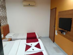 Postel nebo postele na pokoji v ubytování Hotel airport annex