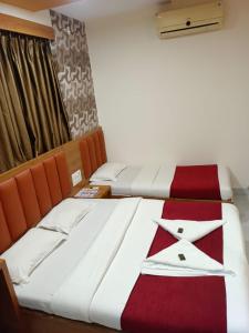 Postel nebo postele na pokoji v ubytování Hotel airport annex