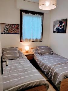 Posteľ alebo postele v izbe v ubytovaní Appartement T2 46m2 avec grande terrasse