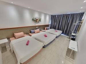 Letto o letti in una camera di One Point Hotel