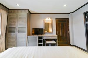 TV a/nebo společenská místnost v ubytování Naiya Buree Boutique Resort