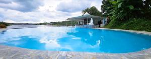 Bazén v ubytování Du Lịch Lâm Hà - Hồ Gia Trang Villas nebo v jeho okolí