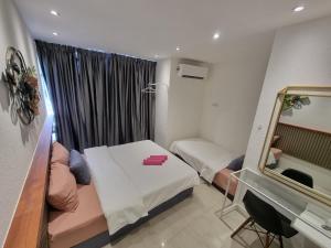 Letto o letti in una camera di One Point Hotel