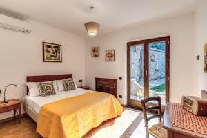 Posteľ alebo postele v izbe v ubytovaní Villa Caruso