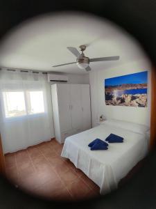 Cama o camas de una habitación en Apartamento El Flamenco Azul Cabo de Gata