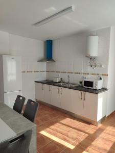 Una cocina o zona de cocina en Apartamento El Flamenco Azul Cabo de Gata