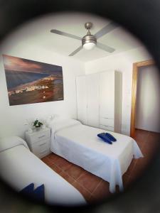 Cama o camas de una habitación en Apartamento El Flamenco Azul Cabo de Gata