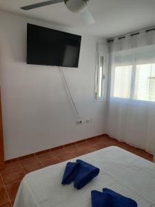 Cama o camas de una habitación en Apartamento El Flamenco Azul Cabo de Gata