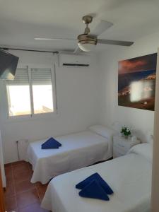 Cama o camas de una habitación en Apartamento El Flamenco Azul Cabo de Gata