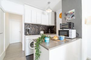 Kuchyňa alebo kuchynka v ubytovaní Apartment Meda Chica