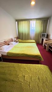 Krevet ili kreveti u jedinici u okviru objekta Motel Tiron