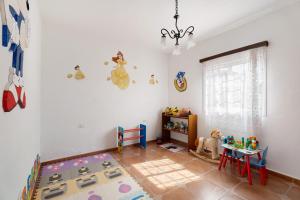Łóżko lub łóżka w pokoju w obiekcie Bonita Casa Arianny con Piscina