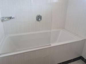 Koupelna v ubytování Mmelesi Lodge + 46 fotografií