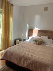 Ένα ή περισσότερα κρεβάτια σε δωμάτιο στο PIORNAIS APARTMENT +14 φωτογραφίες