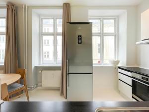 Kuchyň nebo kuchyňský kout v ubytování Beautiful One-Bedroom Apartment in CPH City