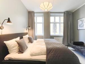 Postel nebo postele na pokoji v ubytování Beautiful One-Bedroom Apartment in CPH City