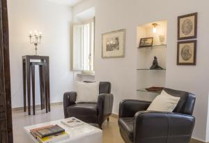 A seating area at Villa San Marco - Homelike Villas