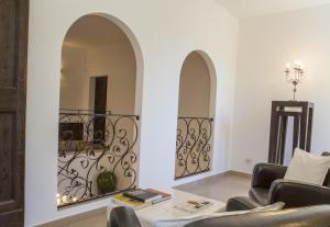 A seating area at Villa San Marco - Homelike Villas