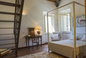 A bed or beds in a room at Villa San Marco - Homelike Villas