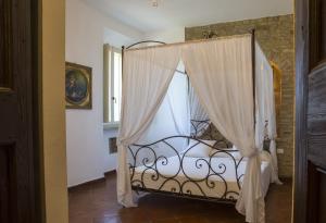 A bed or beds in a room at Villa San Marco - Homelike Villas