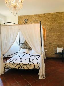 A bed or beds in a room at Villa San Marco - Homelike Villas