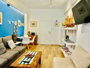 A seating area at Royal Blue Grand Suite No 3