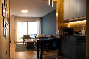 Kuchyň nebo kuchyňský kout v ubytování Design Apartment with Garden
