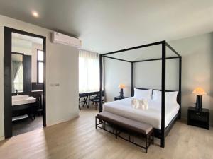 O2 The Residence โอทู เดอะ เรสซิเดนซ์客房内的一张或多张床位