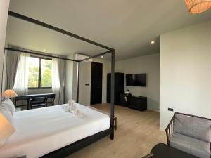 O2 The Residence โอทู เดอะ เรสซิเดนซ์客房内的一张或多张床位