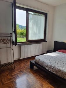Postel nebo postele na pokoji v ubytování B&B Villa Ghira Como
